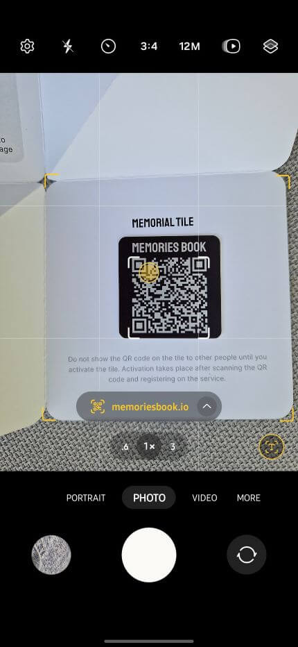 Scan the QR code on the memorial plaque